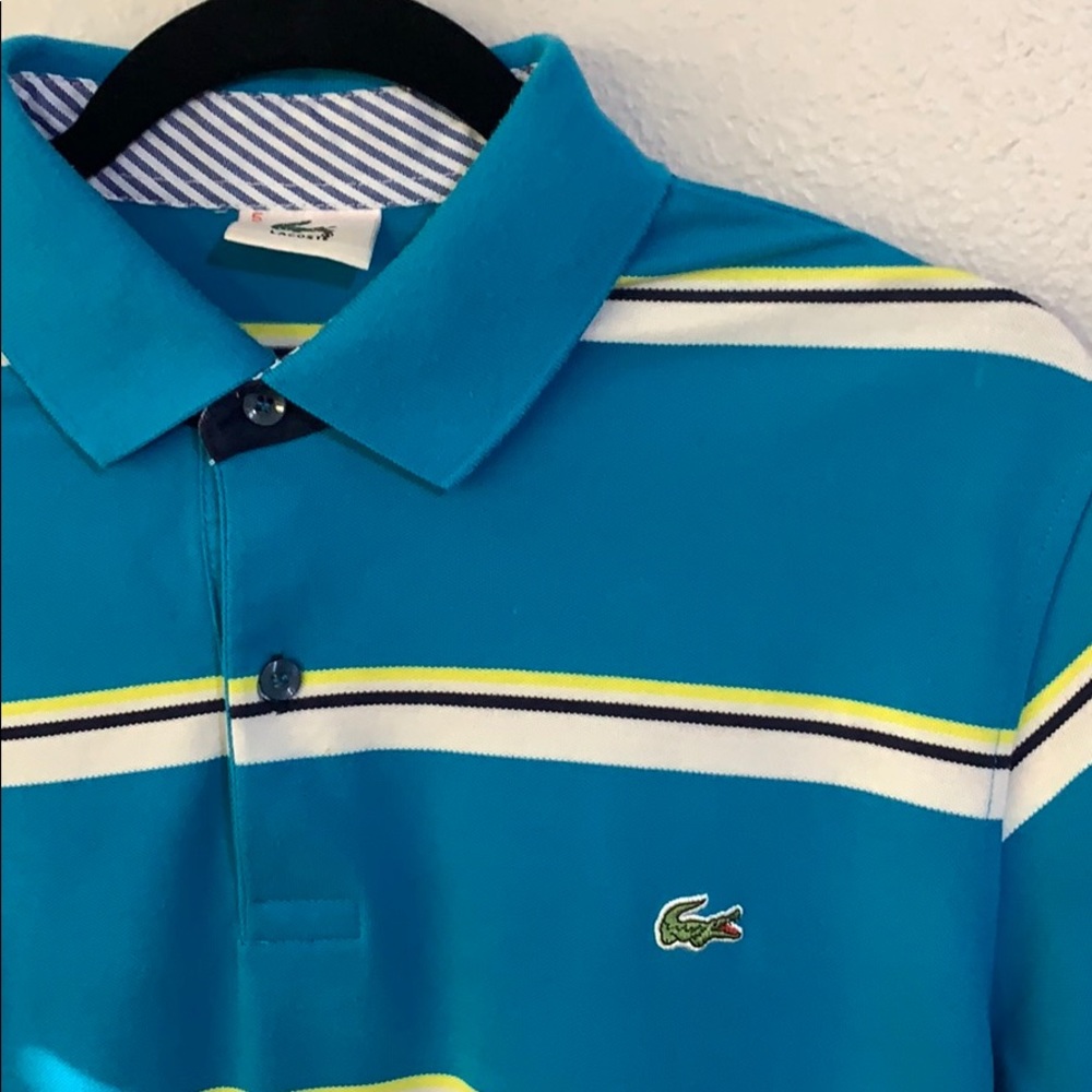 Lacoste polo shirt looks like size Small